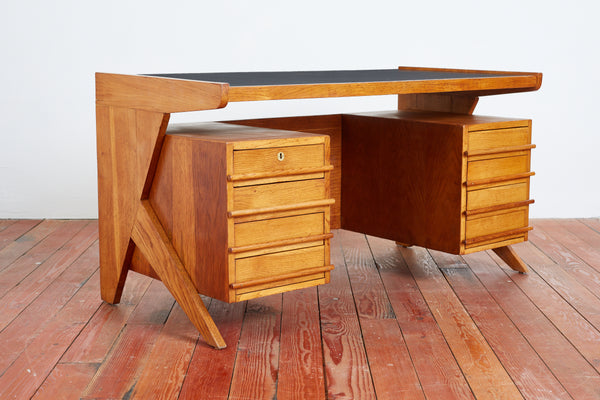 https://orangefurniture.com/cdn/shop/files/002_gio_ponti_desk_062_grande.jpg?v=1703098442