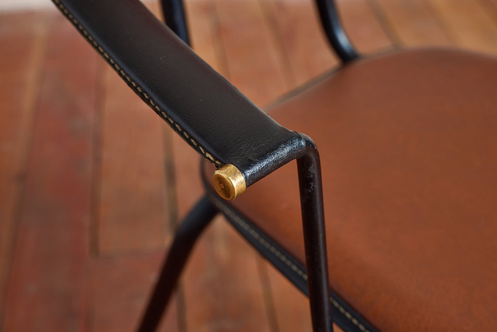 Pair of Jacques Adnet Armchairs