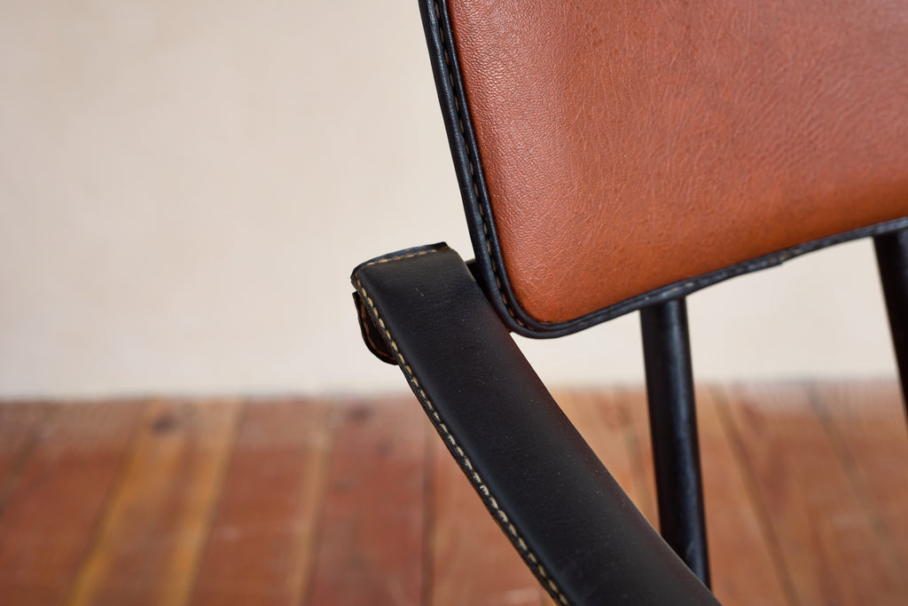 Pair of Jacques Adnet Armchairs