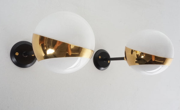 Pair of Stilnovo Style Articulating Sconces